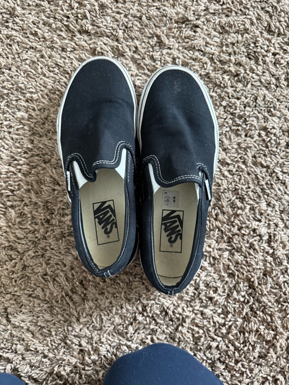 Vans Classic Slip-On Sneakers in Black and White